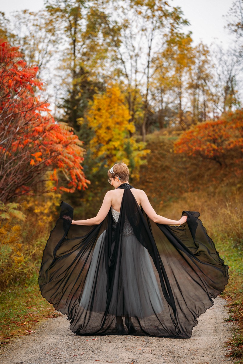 bride playing with dress for portrait